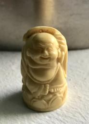 Happy Buddha carving image 1