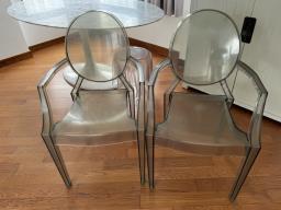 2 plastic chairs image 1