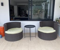 Two Rattan Outdoor Chairs image 1
