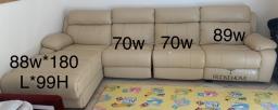 Recline Leather sofa with use chargers image 1