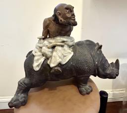 Antique Figurine Man On Rhinoceros image 1