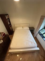 Lovely white queen-sized bed image 2