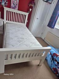 Single wooden bed with mattress image 1