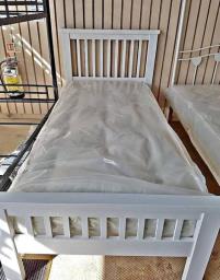 single wooden bed with mattress image 1