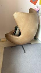 Brown leather egg chair image 1