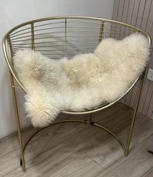 Gold chair with furry white throw image 1