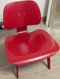 Red Eames molded plywood lounge chair image 1