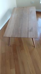 A wooden coffee table image 2