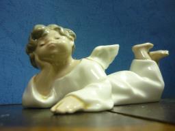 Lladro figurine bored Cupid image 1