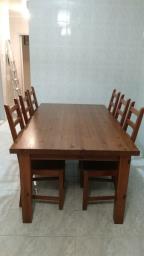 Wooden table with 6 chairs image 1