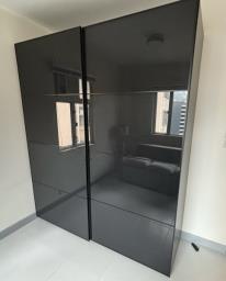 Large closet with glass sliding door image 1