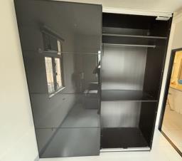 Large closet with glass sliding door image 4