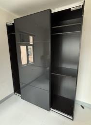 Large closet with glass sliding door image 6