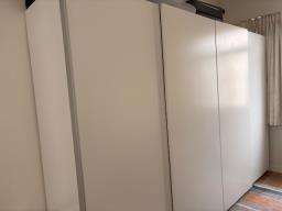 Two Ikea wardrobes with sliding doors image 2