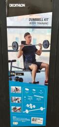 Decathlon 50kg weights and bar set image 1