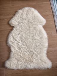 Pair of sheep skins image 1