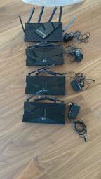 Set of 4 Tplink routers - Almost new image 1