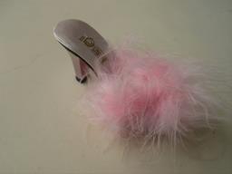 ceramic sandal with feather decoration image 1