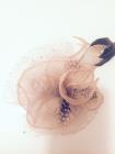 peach flower ornament with feather image 1