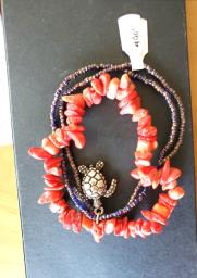 red coral chips bracelet with pouch image 2