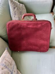 suede travel bag