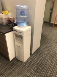 Water dispenser and 19 bottles of water image 1