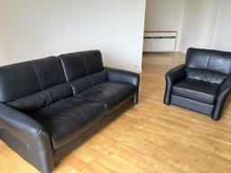 Black sofa and armchair image 1