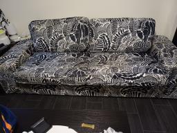 Three seaters Sofa in good condition image 1