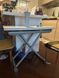 Folding table with chairs image 1