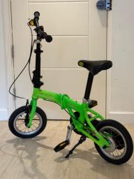 Kids fold bike that an adult can ride to image 1