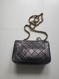 Chanel Diana bag and pearl earrings image 3
