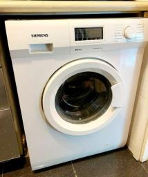 Washing machine with dryer function image 1