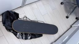 Skateboard and helmets image 1