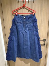 Denim skirt with embroidered flowers image 1