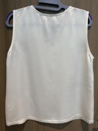 White sleeveless top image 2