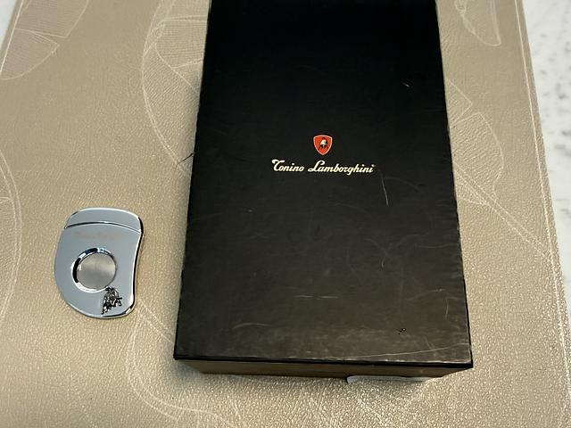 Brand name silver cigar cutter