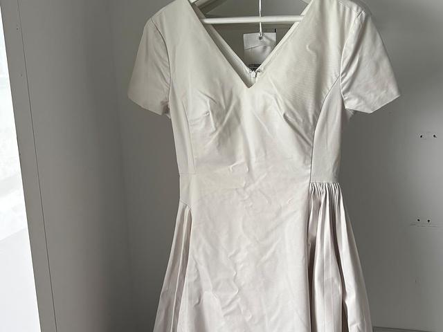 White One-piece Dress ($300)