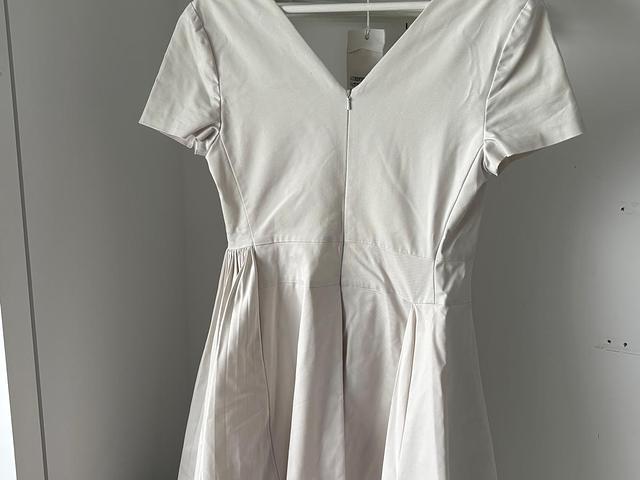 White One-piece Dress ($300)