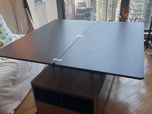 Coffee table turns into dining table 