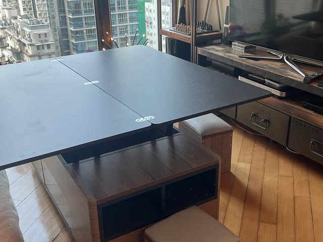 Coffee table turns into dining table 