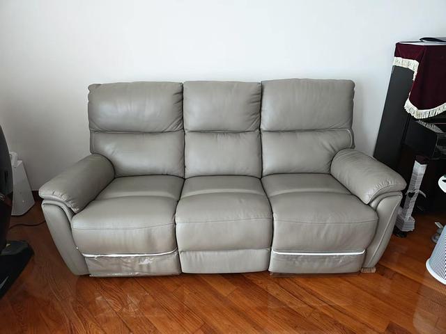 Gently used genuine leather 3-seater sofa