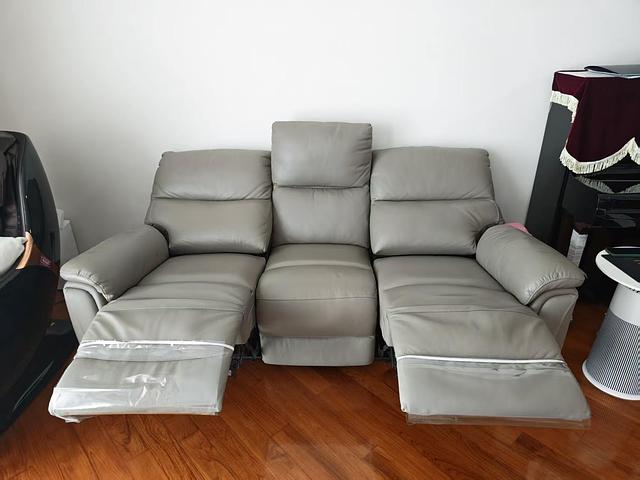 Gently used genuine leather 3-seater sofa
