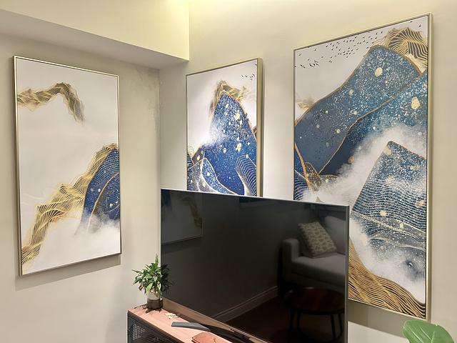 Set of four mountain-themed framed wall art