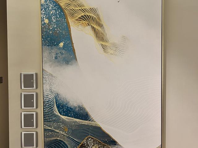 Set of four mountain-themed framed wall art