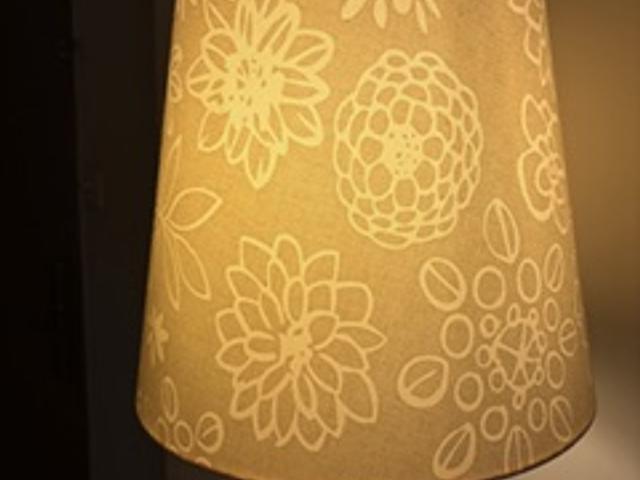 Two IKEA tall lamp stands - one with shade