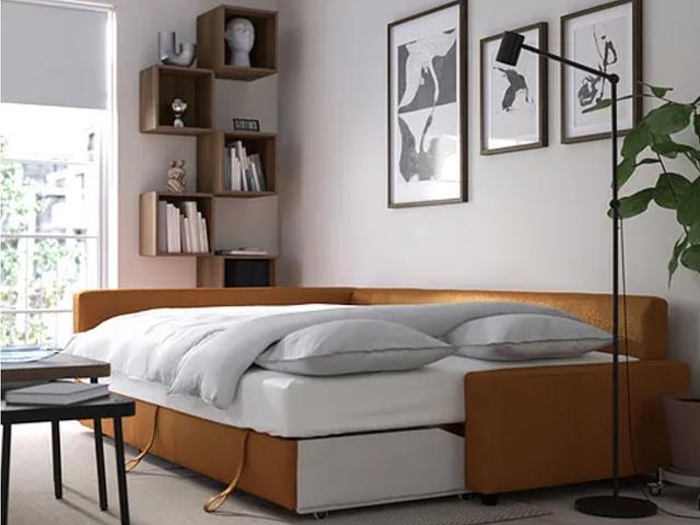 Ikea L shape sofa bed, new covers